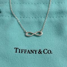 Tiffany Infinity Is A Powerful Symbol Of Continuous Connection, Energy And Vitality. Sterling Silver Adjustable, 16-18” Https://Www.Tiffany.Com/Jewelry/Necklaces-Pendants/Tiffany-Infinity-Pendant-37725951/ Tiffany Infinity Necklace, Jewelry Tiffany, Infinity Pendant, Infinity Necklace, Tiffany Co Jewelry, Tiffany & Co., Womens Jewelry Necklace, Jewelry Necklace Pendant, Jewelry Necklaces