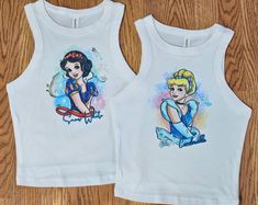 CROP TANKS- Available in size XS-2XL CROP TOPS- Available in sizes XS-3XL TSHIRTS- Available in XS-4XL Tshirts are unisex but do not run big. They are just the right fit. If you like a little extra room for an oversized tee, it's recommended to size up one, from your normal size. Adult and kids Tshirts, tanks, sweatshirts and bleach tee's and tank tops are available too!  The shirts are made of soft, good quality cotton and polyester materials. This ingenious material has the durability of polye Crop Tanks, Tshirt Custom, Princess Shirt, Elsa Anna, Extra Room, Mulan, Oversized Tee, Moana, Pocahontas