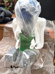 there is a plastic bag wrapped around a vase