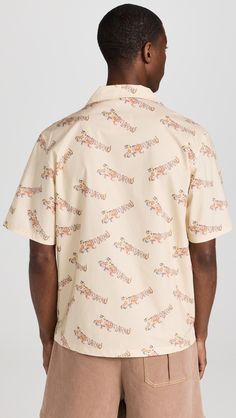 Find MARNI Short Sleeved Bowling Shirt on Editorialist. Fabric: Lightweight, non-stretch shirting. Tiger logo print. Camp collar. Short sleeves. Button placket. Patch breast pocket. Shell: 100% cotton. Wash cold or dry clean. Made in Italy. Measurements: Measurements from size 50 Length: 28.75in / 73cm Chest: 44in / 112cm Tiger Logo, Bowling Shirt, Soft Beige, Bowling Shirts, Button Placket, Bowling, Logo Print, Fabric Weights, New Arrivals