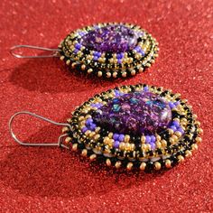 Purple, Gold And Black Hand Beaded Earrings On Stainless Steel Kidney Wires. Backed On Faux Leather Hand Made By Me. Purple Earrings With Colorful Beads For Crafting, Purple Beaded Festival Earrings, Purple Beaded Earrings For Festival, Purple Beaded Earrings With Round Beads For Festival, Purple Beaded Teardrop Earrings With Ear Wire, Festival Purple Beaded Earrings With Round Beads, Purple Teardrop Beaded Earrings With Ear Wire, Purple Beaded Earrings For Party, Purple Jewelry With Colorful Beads For Party