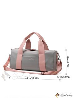 a gray and pink duffel bag with straps on the bottom, measurements for it