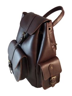 This leather backpack is more than practical and stylish... our sumptuous leather backpack is classic! Simple and strong lighter-weight design, perfect rucksack to carry your basic stuff, tablet, mobile phone, wallet, books, etc. Buckle closure on main flap with drawstring closure Classic Leather Satchel Backpack For Trips, Classic Leather Backpack With Leather Strap For Daily Use, Luxury Brown Leather Backpack For Travel, Luxury Brown Leather Backpack For Trips, Luxury Everyday Leather Backpack, Rectangular Leather Travel Backpack, Classic Backpack With Adjustable Strap For Trips, Leather Strap Satchel Backpack For Daily Use, Classic Brown Leather Backpack With Leather Strap