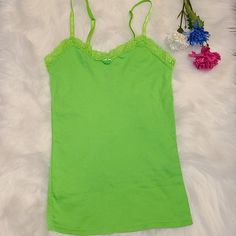 Brighten Up Anyone's Day With This Lime Green Stretchy Tank. Adjustable Straps. Lined With Lace At The Top. Brand New! **Prices Are Firm** But Open To Reasonable Offers ** No Trades** **Fast Shipping ** Free Treat With Every Purchase Green Casual Camisole With Lace Trim, Casual Green Camisole With Lace Trim, Green Trendy Cotton Camisole, Trendy Green Cotton Camisole, No Boundaries, Fancy Dresses, Boundaries, Lime Green, The Top