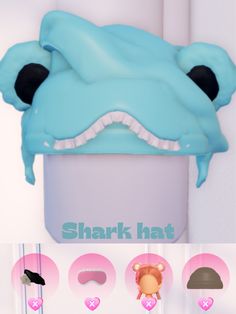 there is an image of a shark hat on the wall with other items around it