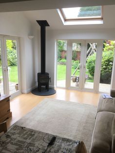 a living room filled with furniture and a fire place