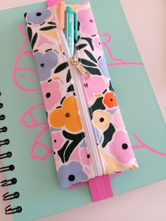 A new beautiful floral print in our Spring Collection - limited edition!
Elastic Pencil Case suitable for A5 notebooks, so you NEVER LOSE YOUR PEN AGAIN! Back To School Pencil-shaped Organizer With Zipper, Pencil Shaped Pencil Case With Zipper For Organization, Back To School Zipper Pouch Organizer, Back To School Pencil Organizer With Zipper Pouch, Pencil-shaped Zipper Pouch Pencil Case For Organization, Pink Zipper Pouch Stationery For Organization, Back To School Stationery Zipper Pouch For Daily Use, Back To School Stationery With Zipper Pouch, Travel Pencil Zipper Pouch Stationery