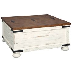 a wooden box with wheels on the bottom and two knobs at the top that are attached to it