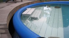 an inflatable swimming pool on the ground