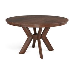 a round wooden table with two crossed legs