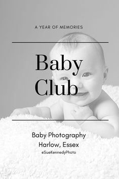 a baby laying on top of a blanket with the words baby club in black and white