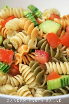 pasta salad with cucumbers, tomatoes, and green onions