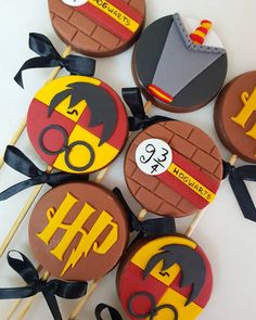 decorated cookies are arranged on top of each other in the shape of harry potter's hogwarts