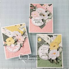 three cards that have flowers on them