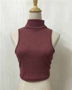 Trendy Ribbed Turtleneck Tank Top, Fitted Ribbed Sleeveless Crop Top, Fitted Sleeveless Ribbed Crop Top, Fitted Ribbed Halter Neck Crop Top, Fitted Halter Top For Fall, Ribbed Sleeveless Stretch Crop Top, Stretch Ribbed Sleeveless Crop Top, Sleeveless Ribbed Stretch Crop Top, Fitted Sleeveless Crop Top For Fall