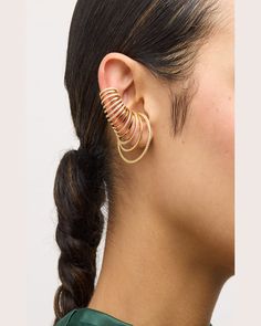 Find FERN FREEMAN JEWELRY Large Multi Hoop Ear Cuff With Diamonds, Single on Editorialist. Fern Freeman Jewelry cuff earring Polished 18karat yellow gold White diamonds as accents 0.22 total carat weight Sold individually Clipon back Made in USA Yellow Gold Single Ear Cuff In Metal, Elegant Hoop Ear Cuff With Ear Wire, Metal Hoop Ear Cuff, Elegant Hoop Style Pierced Ear Cuff, Elegant Pierced Hoop Ear Cuff, Yellow Gold Single Ear Cuff For Party, Modern Clip-on Ear Cuff, Party Yellow Gold Single Ear Cuff, Metal Hoop Ear Cuff For Pierced Ears