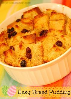 bread pudding with raisins in a white dish on a colorful tablecloth and the words easy bread pudding