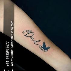 a person with a tattoo on their arm that says love and an image of a bird