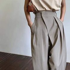 SPECIFICATIONSWaist Type: HIGHStyle: CasualSeason: Spring/AutumnPattern Type: SolidPants: TrouserPant Style: Wide Leg PantsOrigin: CN(Origin)Model Number: NKZ042Material: polyesterLength: Full LengthItem: Suit pantsHigh quality: YesGender: WOMENFront Style: PleatedFit Type: LOOSEFabric Type: BroadclothDropshipping: YesDecoration: AsymmetricalClosure Type: Elastic WaistBrand Name: FeiernanAge: Ages 18-35 Years Old Women's Pantsuit, Office Elegant, Pantsuits For Women, Classic Pants, Pants Vintage, High Waist Pants, Elegant Casual, Summer Pants, Suit Pants