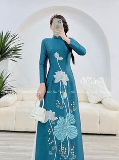 🌻Material: Lụa 🌻Stretchy level: 2/10 🌻 The measurement of this ao dai (long dress) is in Vietnamese size (American size tends to be bigger for the same size). Please LOOK AT THE SIZE CHART CAREFULLY BEFORE ORDERING. There might have some chalk writings on the fabric due to making process. These marks can be washed away easily. 🌻🌻No returns or exchanges Buyer can contact seller about any issues with an order. 🌸 Follow us Facebook/aodaiemily www.aodaiemily.com 💜 Thank you very much!💜 Traditional Fitted Ao Dai For Festive Occasions, Traditional Embroidered Ao Dai For Party, Traditional Blue Fitted Ao Dai, Traditional Fitted Blue Ao Dai, Festive Fitted Embroidered Cheongsam, Embroidered Long Sleeve Ao Dai For Party, Traditional Long Fitted Ao Dai, Elegant Long Sleeve Embroidered Ao Dai, Traditional Fitted Long Ao Dai