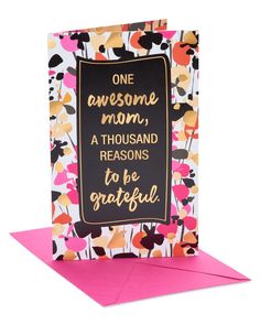 a card that says, one awesome mom is a thousand reason to be grateful on it