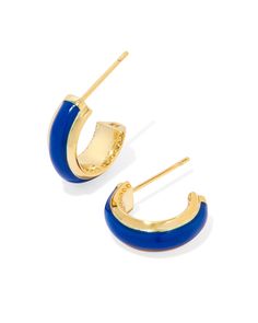 Amp up your earring game with the Ainsley Gold Huggie Earrings in Blue Enamel. The minimal huggie style goes bold with hand-painted enamel embellishments, and the sides feature our signature hoofprint detailing for added texture. Lightweight enough for all-day wear, this pair will take any look from everyday to occasion ready. 0.59'L X 0.56"W STATION Luxury Enamel Hoop Earrings Gift, Steve Madden Mules, Hoof Print, Gold Huggie Earrings, Eyewear Kids, Huggie Earrings Gold, Bath Candles, Summer Sunglasses, Huggie Earrings