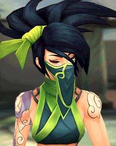 a woman with black hair wearing a green mask