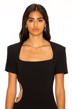 Feel chic in The Zoe Dress. Featuring a long hem, bold shoulders, and sexy side cut out with a diamond chain detail. Pair with statement jewelry and heels for the ultimate look, day or night. Chic Gold Body Chain For Evening, Glamorous Body Chain For Night Out, Evening Body Chain With Chain Strap, Elegant Body Chain For Night Out, Chic Body Chain With Chain Strap For Night Out, Glamorous Fitted Body Chain For Evening Events, Glamorous Fitted Body Chain For Evening, Elegant Gold Body Chain For Night Out, Chic Evening Body Chain With Chain Strap