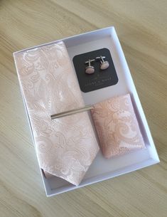 "Store Home Page - https://ivoryrosebridalau.etsy.com Our Pink Paisley tie set is perfect  for weddings, formal occasions, proms, graduations or simply for work.  Gift set includes Tie Pocket Square Tie Pin Cufflinks Gift box Made  from silk & polyester  Tie Measurements Width - 8.5cm or 3.5\" Length - 150cm or 59\" CARE INSTRUCTIONS Dry Clean only Spot Clean Warm Iron Please note if you require more than the displayed amount in stock please message me with the date you require the items as I ma Elegant Groom's Set With Ties, Elegant Sets With Ties For Groom, Classic Wedding Sets With Ties, Elegant Sets With Ties As Gift, Elegant Wedding Suit And Tie Accessories, Classic Pink Suit And Tie Accessories For Wedding, Elegant Pink Gift Sets, Classic Pink Ties For Wedding, Wedding Ties For Men Pink