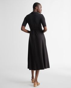 Fitted where you want it, flowy where it feels good. Our Tencel Jersey Midi Wrap Dress is the timeless classic everyone needs in their lineup. Eco-cool and all-day comfy with a rounded collar and modern midi length, it’s as soft as it is sustainable, and it’s part of our growing knit-dress collection. Also offered in sizes 1X-3X.  | Quince | Women's Tencel Jersey Midi Wrap Dress in Black, Size XL Classic Black A-line Maxi Dress, Casual Midi Dress With Flattering Silhouette For Work, Fitted Black Versatile Maxi Dress, Black Fitted Versatile Maxi Dress, Fitted Black Maxi Dress Versatile Style, Sleek Black Viscose Midi Dress, Casual V-neck Midi Dress With Flattering Silhouette, Black Fitted Versatile Dress, Black Relaxed Fit V-neck Maxi Dress