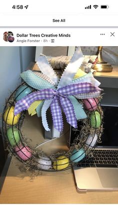 an image of a wreath made out of paper on a computer desk with the words dollar tree creative minds in front of it