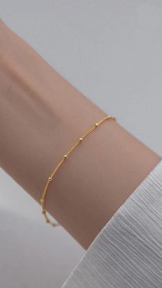 Our lightweight Minimal Satellite Chain Bracelet brings a fresh feel to your wardrobe. Simple and shimmery, this bracelet begs to be layered with others but can be worn alone for a minimal, polished look.

>> Minimal Satellite Chain Bracelet: https://pinealvisionjewelry.com/products/minimal-satellite-chain-bracelet Simple Gold Bracelet With Adjustable Chain, Trendy Rose Gold Bracelet With Delicate Chain, Classic Rose Gold Chain Bracelet With Delicate Chain, Classic Delicate Chain Bracelet In Rose Gold, Dainty Rose Gold Bracelet With Delicate Chain, Classic Delicate Rose Gold Chain Bracelet, Minimalist Gold Chain Bracelet With Simple Design, Gold Minimalist Chain Bracelet With Simple Design, Gold Minimalist Bracelet With Delicate Chain