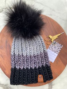 "This 100% merino wool hat has a slouchy fitting style and is one size fits most.  Can be hand washed in cold water and laid flat to dry. If your hat ever gets too fuzzy from lots of winter use, feel free to use a fabric shaver to tidy it up again. Natural fibers need a little trim up every year or two depending on use, just like your favorite sweaters! Fabric shavers are available at most major retailers and are inexpensive.  This hat automatically ships without a pom unless Pom option is chosen at checkout. Remove Pom prior to washing if you've purchased the Pom option. Once dry, you can easily secure again using the included Pom Button.  Only ethically sourced Merino wool is used. What makes it ethically sourced? I only use yarn brands that are guaranteed mulesing-free, ensuring that no Handmade Wool Beanie For Cold Weather, Handmade Hats For Fall, One Size Fits Most, Handmade Fall Hats, One Size Fits Most, Handmade Fall Hats One Size Fits Most, Handmade Wool Hats For Cold Weather, Merino Wool Beanie Hat, Handmade Wool Beanie One Size Fits Most, Merino Wool Hat For Cold Weather, Handmade Wool Hats One Size Fits Most