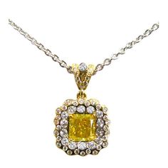 This elegant 1.10ct fancy greenish yellow radiant diamond has VVS2 clarity and is GIA certified. Surrounded by .58cts of pave, and set in 18K and platinum, this yellow diamond is sure to sparkle! The pendant comes on an 18K chain. Antique Necklaces, 18k Gold Chain, Fancy Yellow Diamond, Yellow Line, Special Necklace, Jewel Necklace, Elegant Pendant, Radiant Diamond, Antique Necklace