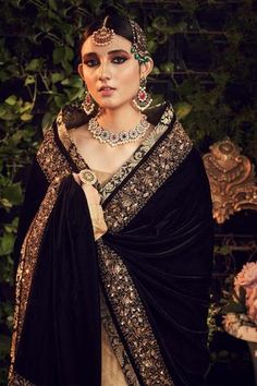 Oxidised gold kurta with embroidered neckline, cuffs and comes with gharara. Paired with silk velvet floral embroidered black dupatta.
Component: 3
Embroidered
Neckine: Round
Sleeve Length: Full
Fabric: Silk Tissue, Silk Velvet
Color: Gold
Embroidered dupatta
Zardosi embroidery - Aza Fashions Tissue Lehenga, Black Dupatta, Velvet Dupatta, Gold Lehenga, Zardosi Embroidery, Ghagra Choli, Embroidered Dupatta, Embroidered Neckline, Gold Silk