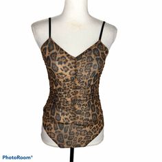 Code X Mode Small Animal Print Sheer Bodysuit Ruched Sleeveless. Condition Is "New With Tags". Measurements Taken With Item Laying Flat On Table Approximate Measurements Bust 13 Smoke Free Environment Thank You For Viewing Leopard Print Sleeveless Swimwear For Party, Sleeveless Stretch Leopard Print Bodysuit, Brown Sleeveless Swimwear For Party, Sleeveless Brown Swimwear For Party, Brown Sleeveless Party Swimwear, Black Tank Top Bodysuit, Tank Top Bodysuit, Bodycon Bodysuit, Mock Neck Bodysuit