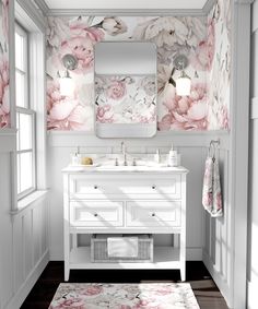 a bathroom with floral wallpaper and white vanity, mirror and rug on the floor