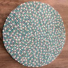 a blue and white plate sitting on top of a wooden table