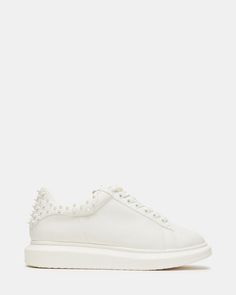 FROSTING White Low Top Lace Up Sneaker | Men's Sneakers – Steve Madden Casual Low-top Sneakers With Studs, Casual Studded Lace-up Sneakers, White Platform Sneakers With Studded Outsoles For Spring, Spring White Platform Sneakers With Studded Outsoles, Casual Studded Sneakers, Studded Low-top Sneakers For Streetwear, Low-top Studded Sneakers For Streetwear, Trendy Spiked Sneakers, White Low-top Sneakers With Spikes