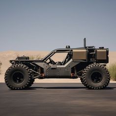 an off - road vehicle is parked in the desert