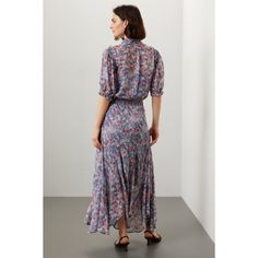 Blue floral cotton (100% Viscose). A-line. Short sleeves. Tie neck. Pull on. 53" from shoulder to hemline. Imported. Blue Flowy Feminine Dress, Feminine Blue Dress With Flowy Skirt, Feminine Blue Flowy Dress, Floral Print A-line Maxi Dress With Flowy Skirt, Floral Print A-line Flowy Maxi Dress, Flowy Floral Print Dress With Short Sleeves, Floral Print Dress With Flowy Skirt And Short Sleeves, Flowy A-line Maxi Dress With Floral Print, Flowy Skirt Dress With Floral Print And Short Sleeves