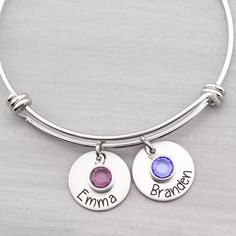 This personalized heart bracelet is a striking addition to any mother or grandmothers jewelry box! INCLUDES: 3/4" stainless steel hearts (choose number needed from pull down menu) expandable stainless steel bangle bracelet (twisted 1st pic, smooth 2nd pic or a cable chain you can hook with lobster clasp on any link) Gift box included The bangle is made of stainless steel which will not tarnish or rust like silver plated or gold plated will. Engraved for a permanent design that will not fade over Adjustable Silver Name Bracelet With Birthstone, Personalized Heart-shaped Name Bracelet In Silver, Adjustable Heart-shaped Sterling Silver Name Bracelet, Personalized Heart Bracelet, Nickel-free Heart-shaped Bracelet For Personalized Gift, Nickel-free Bangle Charm Bracelet For Personalized Gift, Heart Bangle Bracelet, Grandmother Jewelry, Personalised Bangle