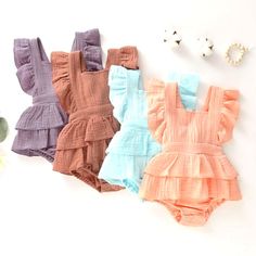 Dress Up Your Little Princess In This Adorable Summer Infant Baby Girls Bodysuits Clothes Princess Ruffle Cotton For 6-24 M. The Floral Pattern And Ruffle Accents Add A Touch Of Charm To The Overall Dress. The Square Neckline And Cotton Material Provide Comfort For Your Baby Girl, Making It Suitable For Both Casual And Formal Occasions. This Dress Is Perfect For Summer And Can Be Worn By Girls Aged 6-9 Months. The Short Dress Length And Blended Fabric Type Make It A Versatile Addition To Your Ba Summer Cotton Onesie With Ruffles, Cute Solid Color Bodysuit For Playwear, Cute Solid Color Playwear Bodysuit, Cotton Ruffled Bodysuit For Playwear, Cotton Bodysuit With Ruffles For Playwear, Sleeveless Solid Color Bubble Romper For Playtime, Cotton Ruffle Onesie For Playwear, Cotton Onesie With Ruffles For Playwear, Playful Cotton Bodysuit With Ruffles