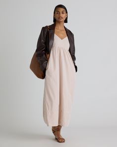 Elevate your wardrobe with our 100% Organic Cotton Sleeveless Maxi Dress - the perfect combination of style and sustainability. Made from high-quality, organic cotton poplin, this dress is not only beautiful, but also environmentally friendly. Featuring a flattering empire waist that skims the body and a flowy maxi length, this dress exudes a feminine and elegant look. The breathable fabric provides comfort and versatility, making it perfect for any occasion - from a summer wedding to a day out Spring Cotton Midi Dress For Casual Occasions, Spring Sleeveless Midi Dress In Relaxed Fit, Sleeveless Midi Dress For Spring With Relaxed Fit, Spring Midi Dress Sleeveless Relaxed Fit, Effortless Dresses For Spring Day Out, Cotton Midi Dress For Day Out In Fall, Chic Cotton Midi Dress For Daywear, Cotton Midi Dress For Fall Day Out, Effortless Cotton Spring Dresses