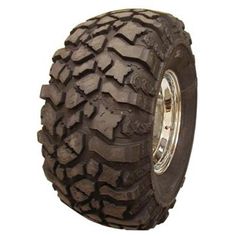 an off - road tire on a white background