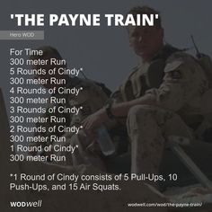 a man in uniform sitting on top of a rock next to a sign that says the payne train