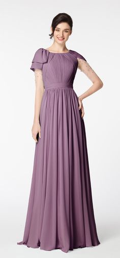 a woman in a long purple dress