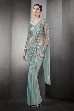 Aqua pre-draped saree in tulle base with linear metallic beaded embroidery.
Component: 1
Pattern: Embroidered
Type Of Work: Striped Pattern
Fabric: Tulle
Color: Blue
Other Details: 
Pre-draped saree
Note: The blouse worn by the model is not for sale
Occasion: Cocktail, Bride - Aza Fashions Casual Saree Look, Saree Blue, Rahul Khanna, Fancy Sarees Party Wear, Saree For Women, Drape Saree, Casual Saree, Blue Tulle, Saree Look