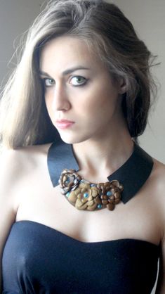 A combination of different colored leather with handmade leather flowers and turquoise. This fashionable leather collar will add charm to your personality. This is a beautiful piece that can be worn for any occasion or event and is guaranteed to cheer and capture everybody's attention. Please visit: www.ninnos.etsy.com www.ninonarimanidze.com Chain Headdress, Chain Headband, Chain Headpiece, Leather Jewellery, Bohemian Accessories, Turquoise Leather, Textile Jewelry, Leather Flowers, Leather Collar