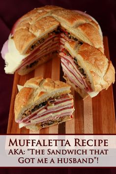 a cut in half sandwich sitting on top of a wooden cutting board with the words muffafetta recipe aka the sandwich that got me a husband'd